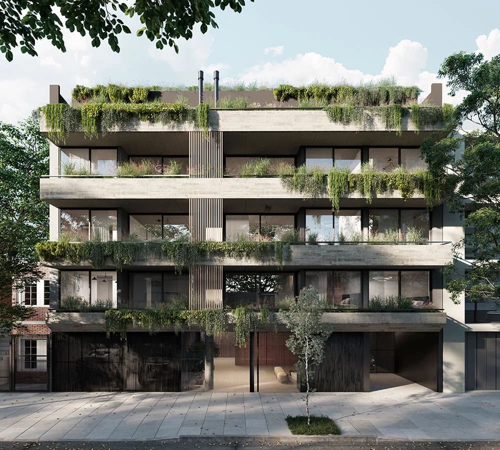 Fachada de un edificio residencial con terrazas y vegetación