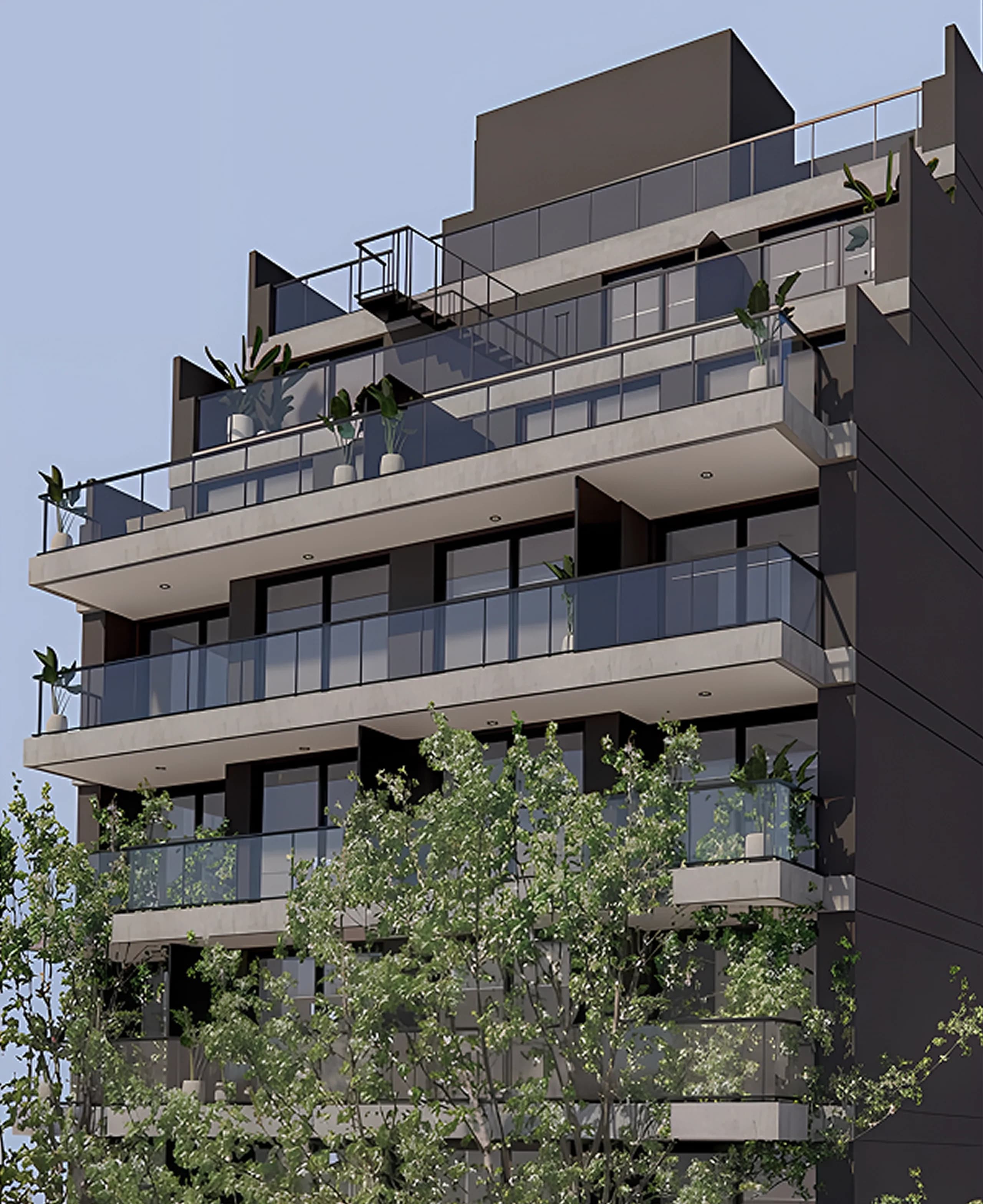 Fachada del edificio TALEYA con balcones y vegetación